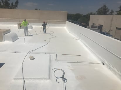Azul Roofing doing a foam roof in Phoenix, Arizona