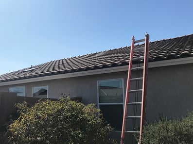 roof inspection with ladder